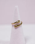 Adjustable gold-colored stainless steel ring, comfortable and customizable to fit any size by Brendoe, available at Designonearth