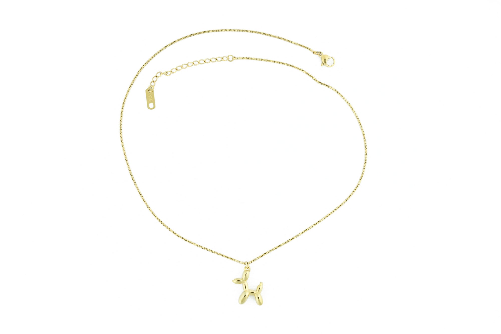 playful and elegant gold necklace with a dog motif, perfect for animal lovers