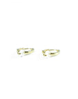 gold earring with a striking diamond ring