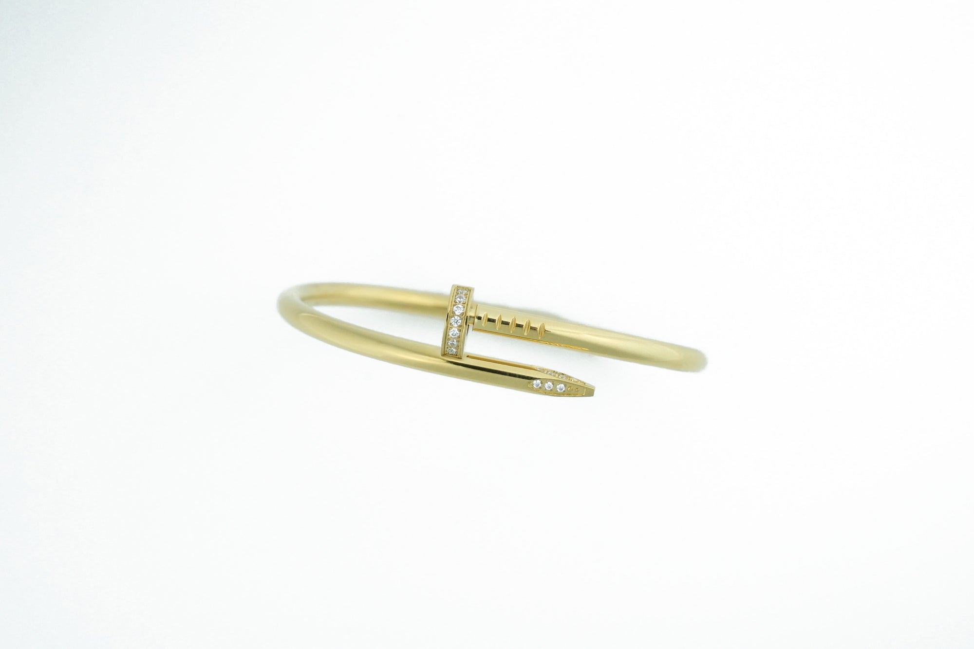 gold bracelet in nail shape jewelry