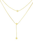 gold ball necklace, highlighting its elegant design, from designonearth