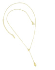gold necklace with drop shaped pendant at design on earth new
