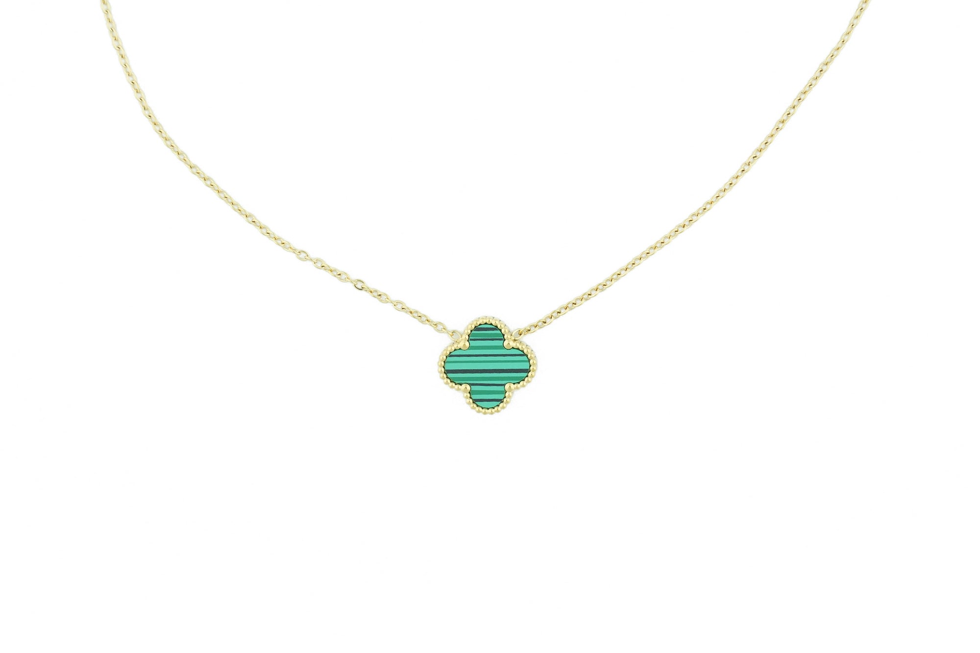 modern necklace with a subtle green clover, ideal for a fresh look