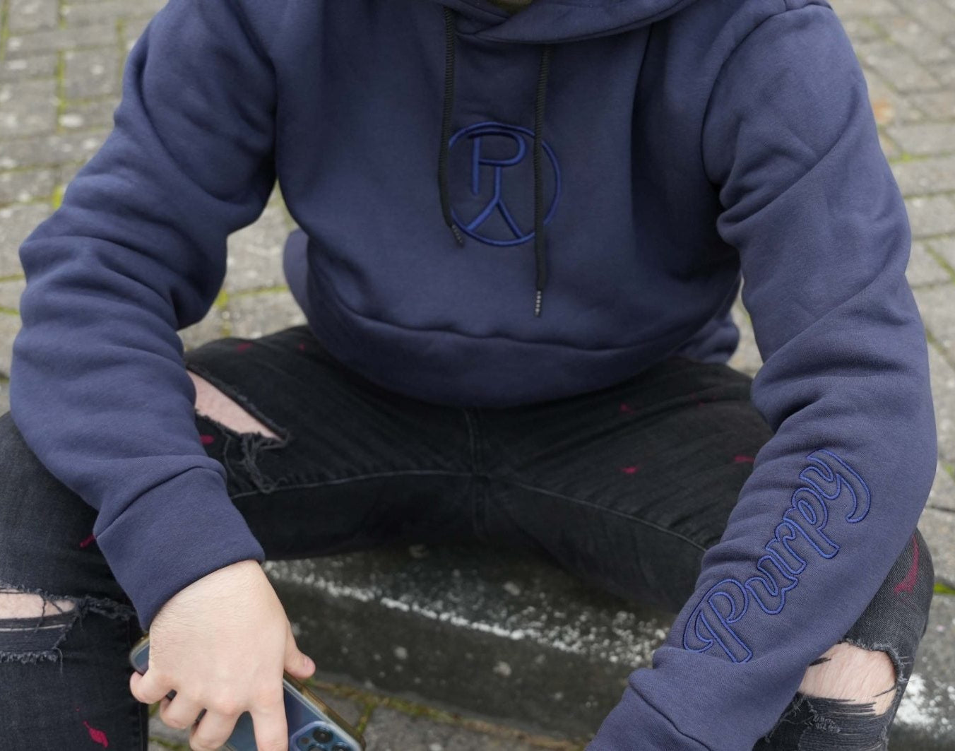 Handmade hoodie in navy with a spacious snap pocket for functional luxury, comfort and perfect for winter, from the brand Purpy