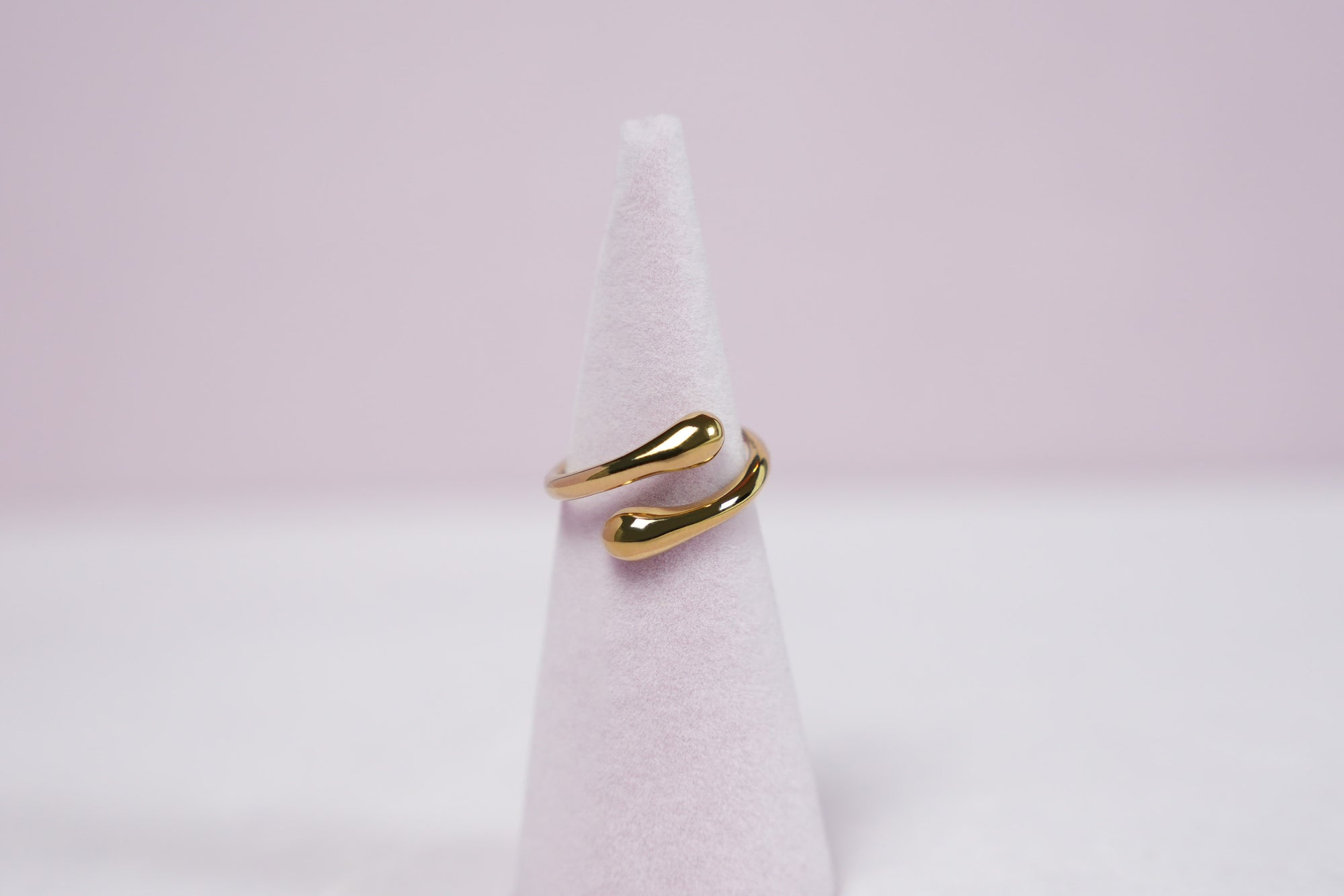 Adjustable gold-colored stainless steel ring, comfortable and customizable to fit any size by Brendoe, available at Designonearth