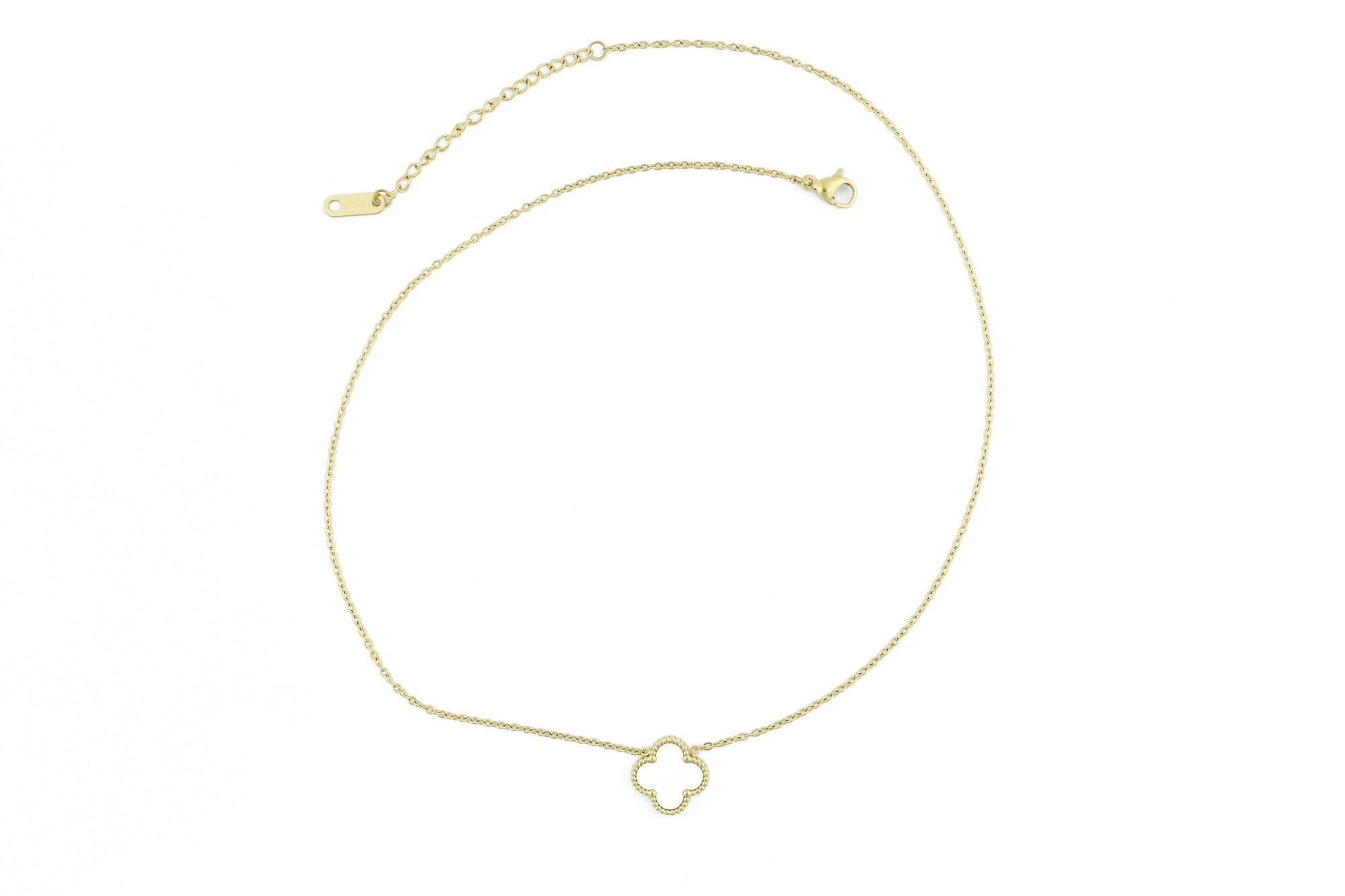 chic necklace with a subtle white clover, perfect for formal and casual outfits,
design on earth