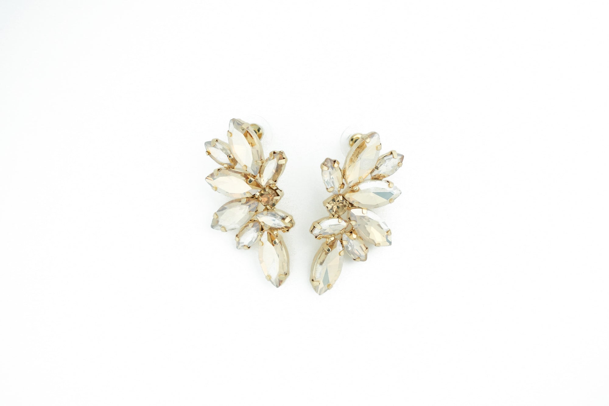 timeless earrings with beige crystals, suitable for formal and casual occasions.