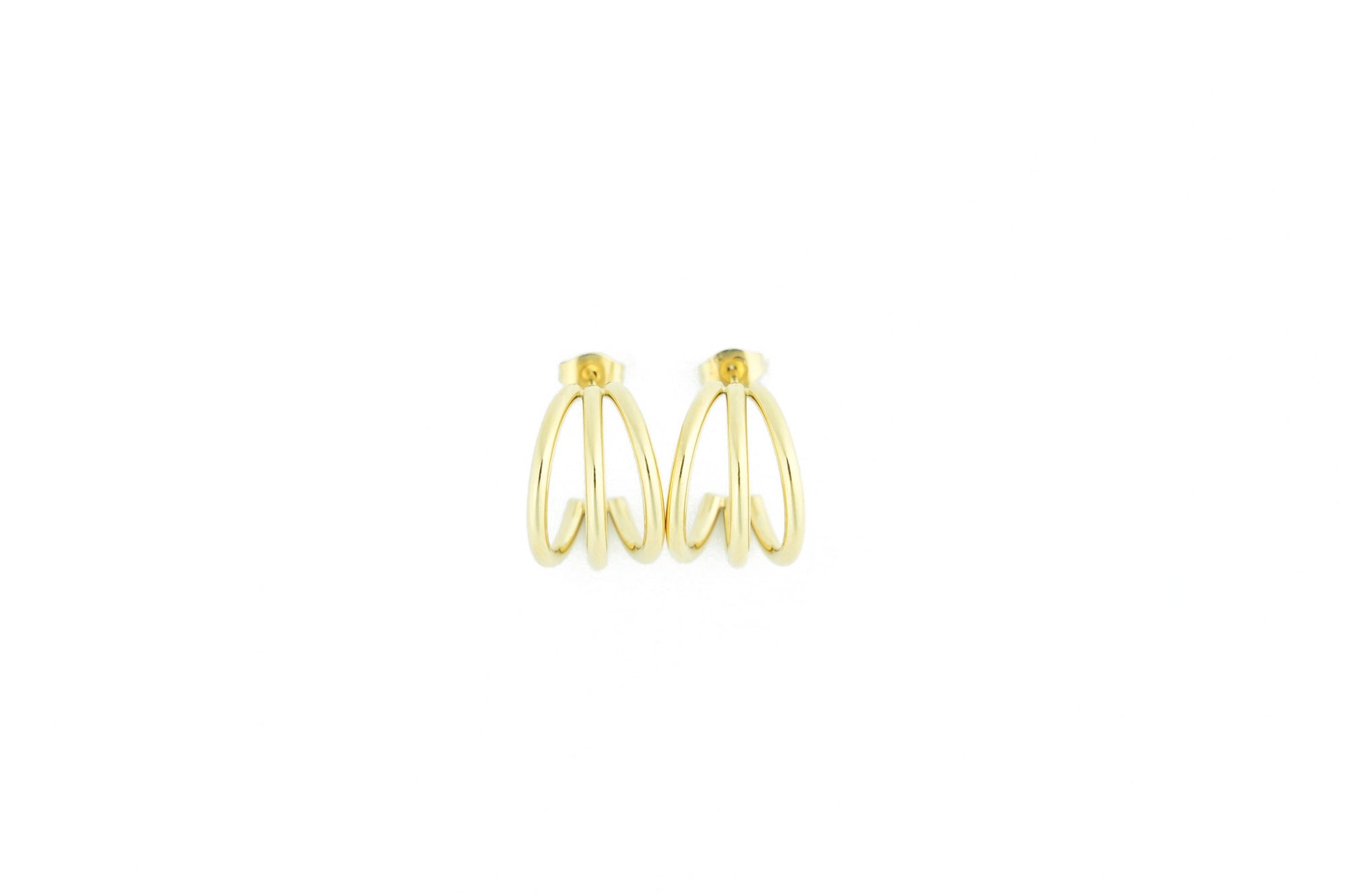 Trendy gold colored earrings by designonearth
 vrond view on a white backgroud