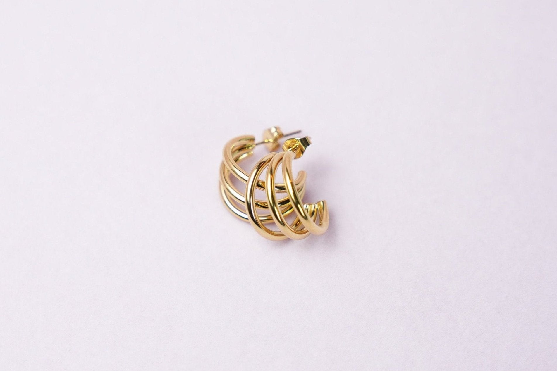 Trendy gold colored earrings by designonearth
