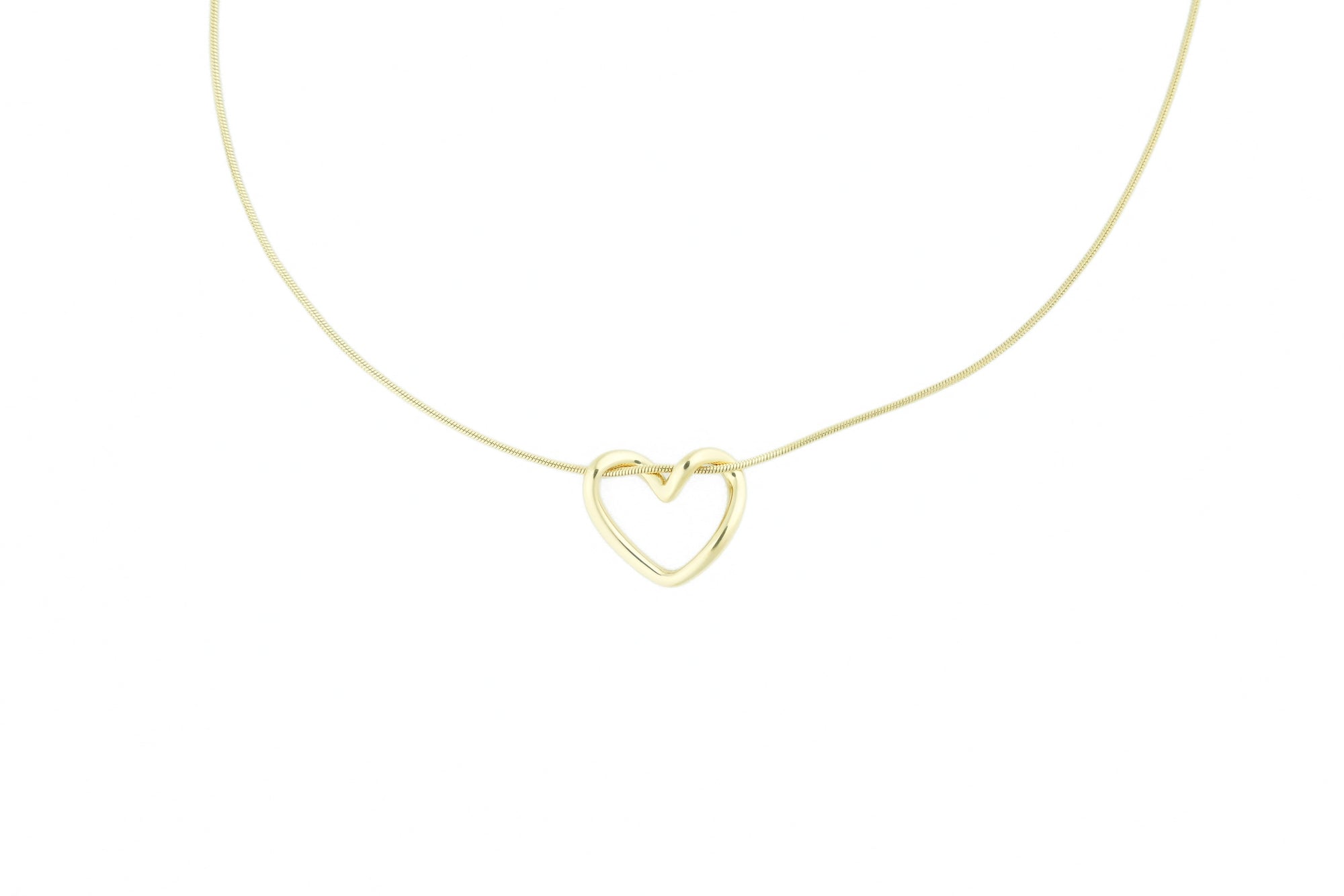 gold heart necklace with an elegant and timeless design, perfect to wear together or alone at design on earth
