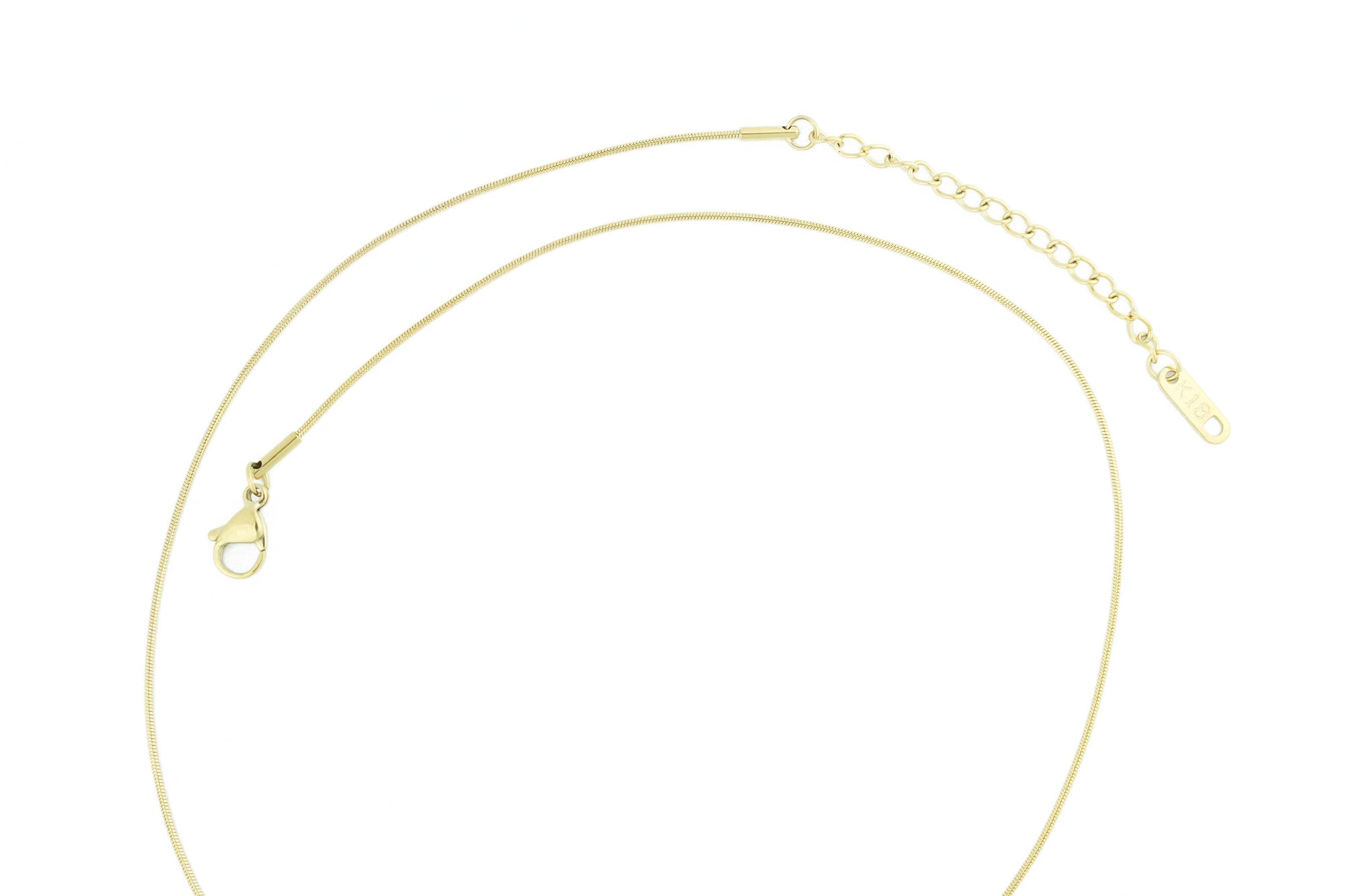 close-up of gold heart pendant necklace, showcasing the fine craftsmanship and luxurious shine, available at Design On Earth
