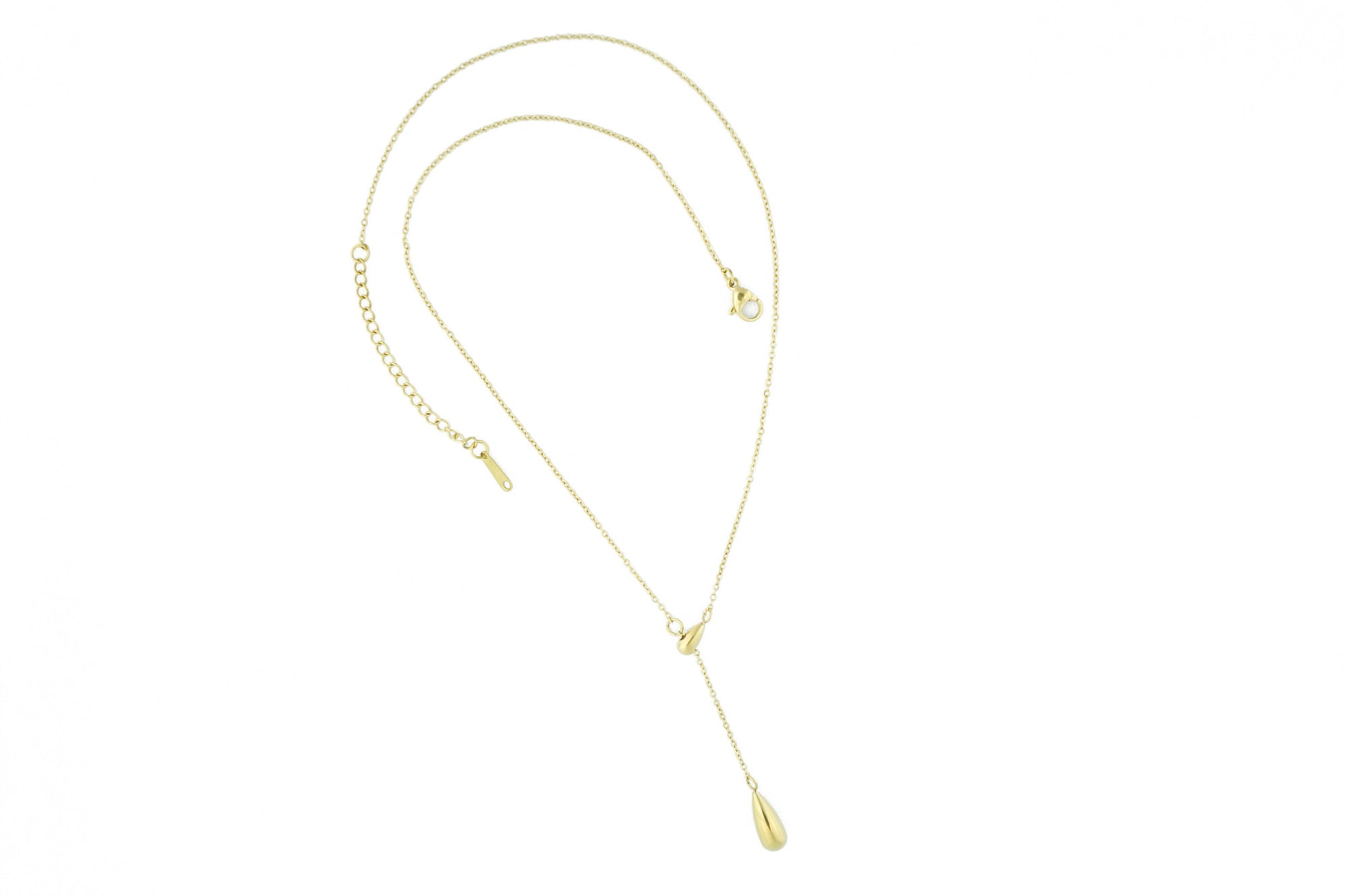 gold necklace with drop shaped pendant at design on earth new