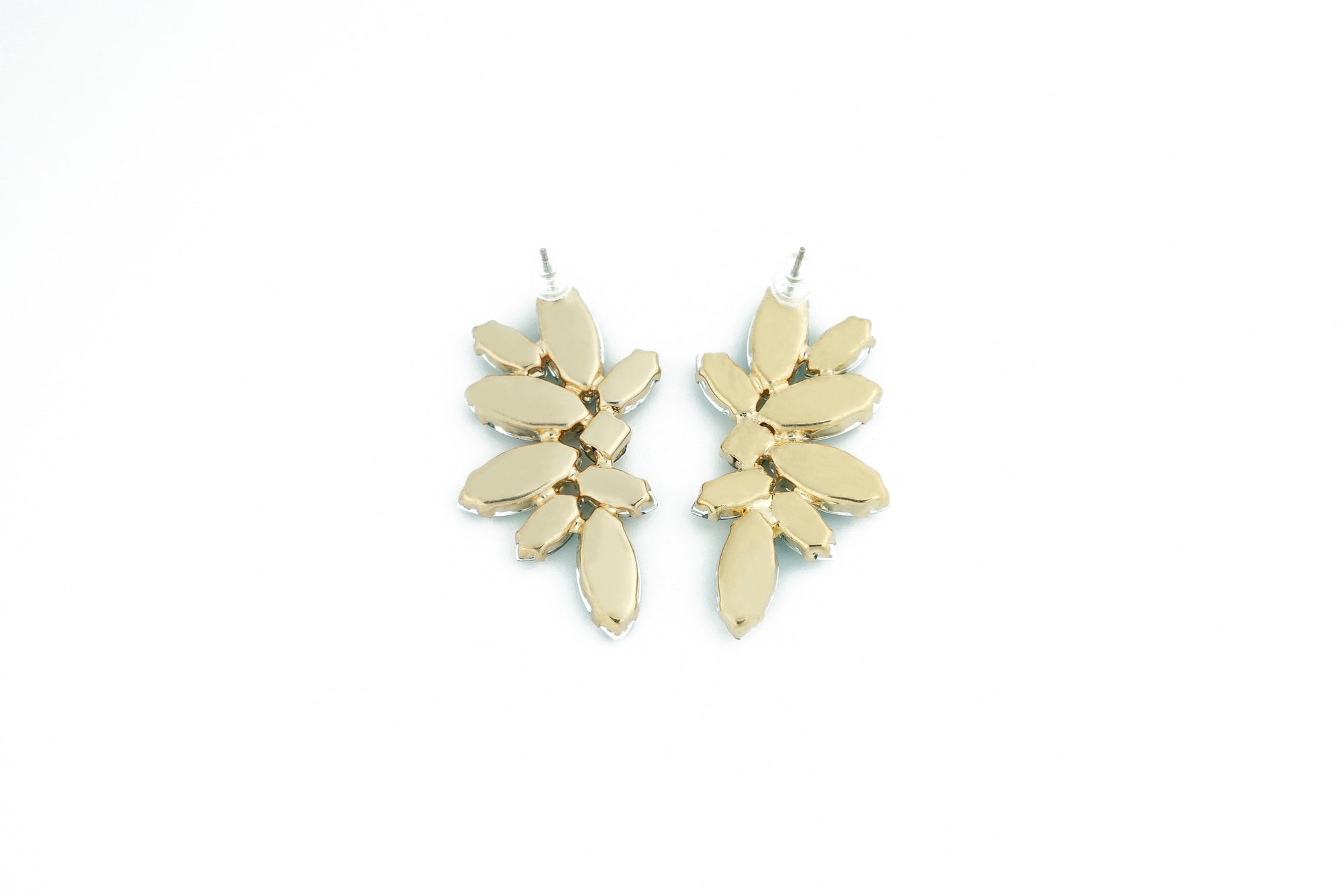 modern and stylish earrings with green crystals, a unique addition to any outfit
