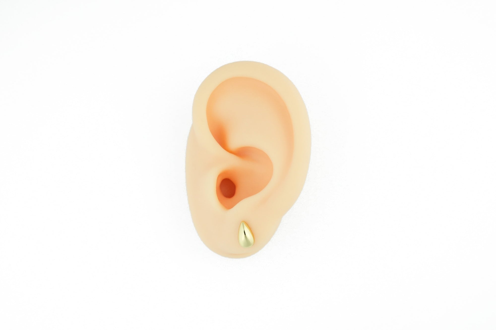 gold drop shaped earrings very beautiful and for all outfits
