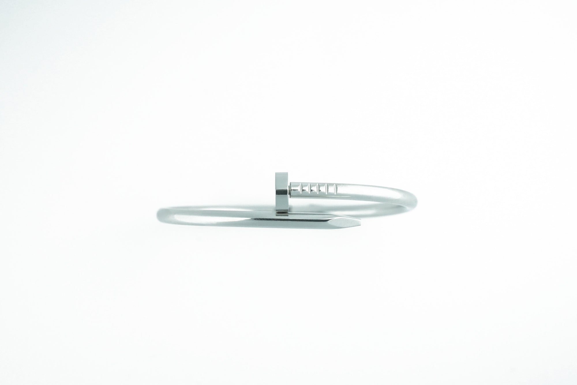 silver_colored_nail_bracelet_for_women