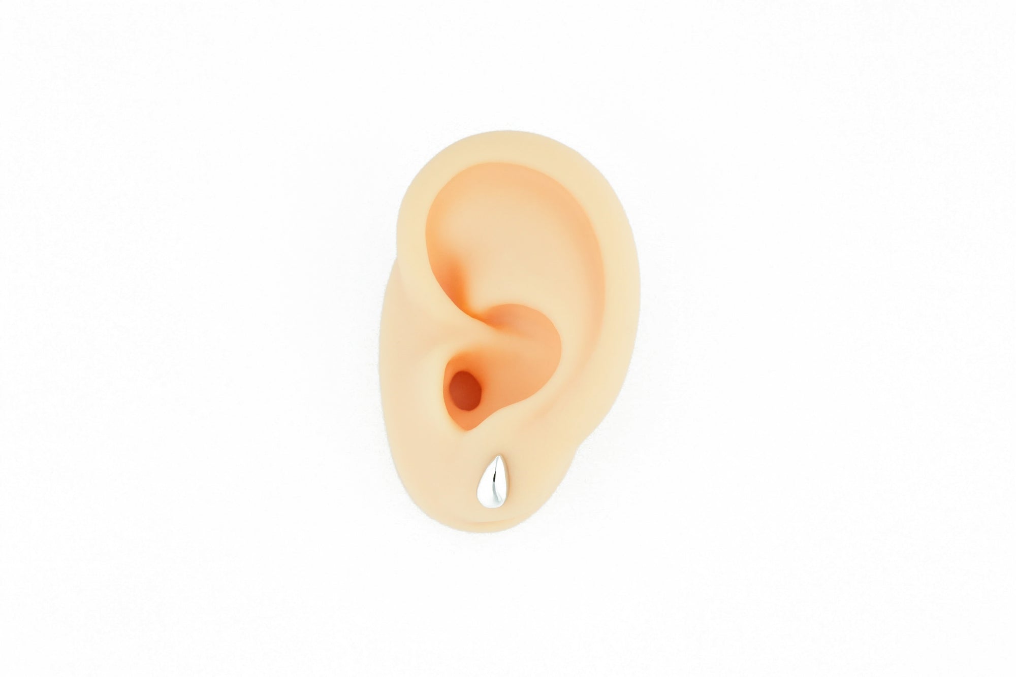 silver earrings in a subtle drop shape, suitable for any outfit.
