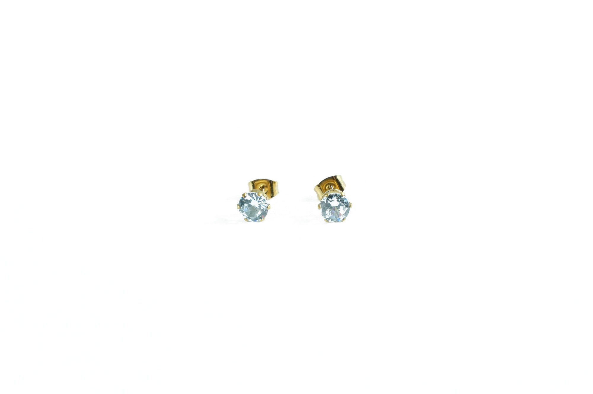 golden earrings with round zirconia stone